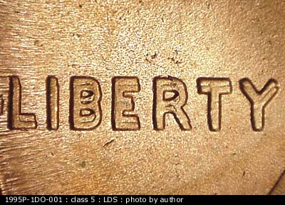 Die-stage C marker on 1995P•1DO•001 (1995 Doubled Die Obverse).