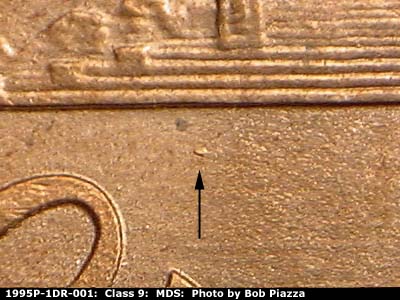 Die-stage B marker on 1995P•1DR•001 (1995 Doubled Die Reverse).