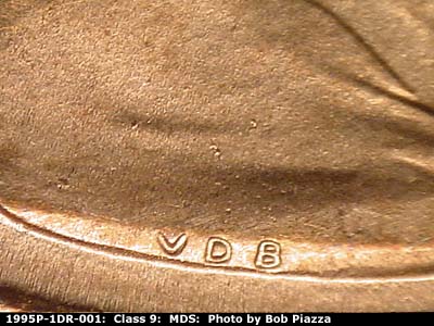 Die-stage B marker on 1995P•1DR•001 (1995 Doubled Die Reverse).