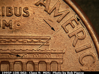 Die-stage B marker on 1995P•1DR•002 (1995 Doubled Die Reverse).
