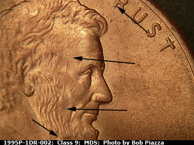 Die-stage B marker on 1995P•1DR•002 (1995 Doubled Die Reverse).
