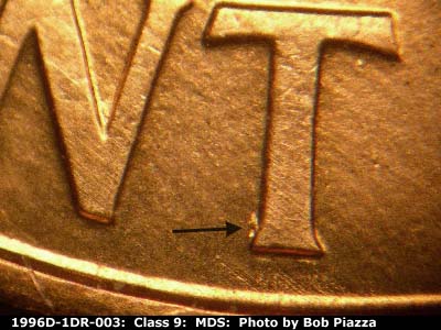 Die-stage B marker on 1996D•1DR•003 (1996 Doubled Die Reverse).