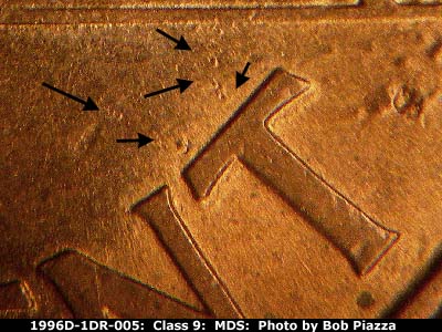 Die-stage B marker on 1996D•1DR•005 (1996 Doubled Die Reverse).