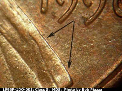 Die-stage B marker on 1996P•1DO•001 (1996 Doubled Die Obverse).