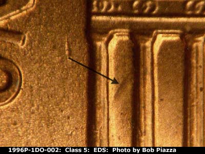Die-stage A marker on 1996P•1DO•002 (1996 Doubled Die Obverse).