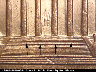 Die-stage B marker on 1996P•1DR•001 (1996 Doubled Die Reverse).