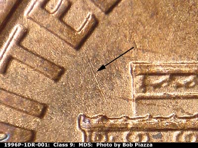 Die-stage B marker on 1996P•1DR•001 (1996 Doubled Die Reverse).