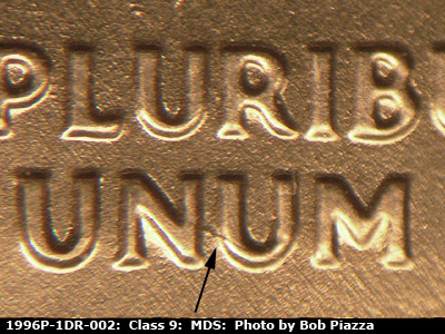 Die-stage B marker on 1996P•1DR•002 (1996 Doubled Die Reverse).