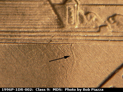 Die-stage B marker on 1996P•1DR•002 (1996 Doubled Die Reverse).