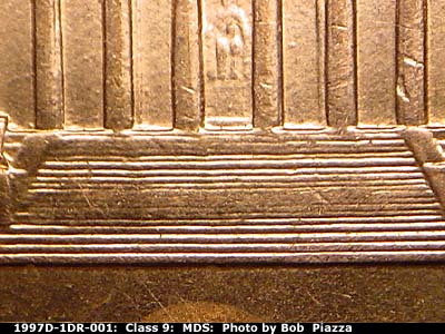 Die-stage B marker on 1997D•1DR•001 (1997 Doubled Die Reverse).