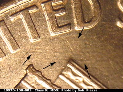Die-stage B marker on 1997D•1DR•001 (1997 Doubled Die Reverse).