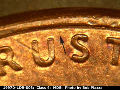 Die-stage B marker on 1997D•1DR•003 (1997 Doubled Die Reverse).