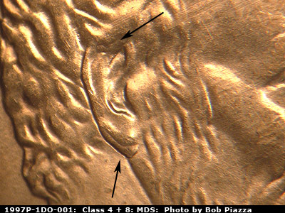 Die-stage B marker on 1997P•1DO•001 (1997 Doubled Die Obverse).