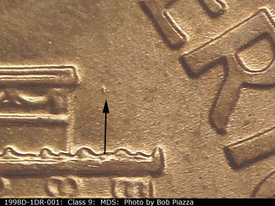 Die-stage B marker on 1998D•1DR•001 (1998 Doubled Die Reverse).