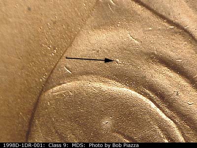 Die-stage B marker on 1998D•1DR•001 (1998 Doubled Die Reverse).