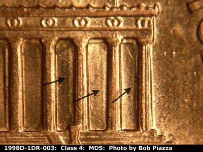 Die-stage B marker on 1998D•1DR•003 (1998 Doubled Die Reverse).