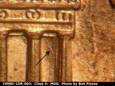 Die-stage B marker on 1998D•1DR•003 (1998 Doubled Die Reverse).