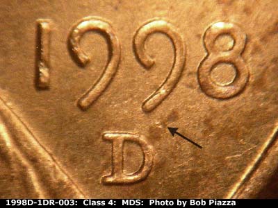 Die-stage B marker on 1998D•1DR•003 (1998 Doubled Die Reverse).