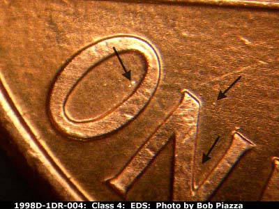 Die-stage A marker on 1998D•1DR•004 (1998 Doubled Die Reverse).