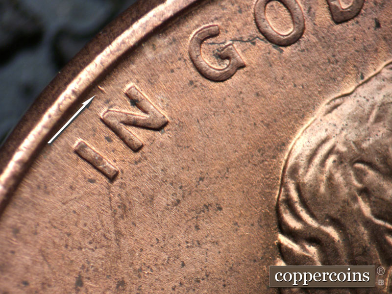 Die-stage B marker on 1998D•1DR•005 (1998 Doubled Die Reverse).