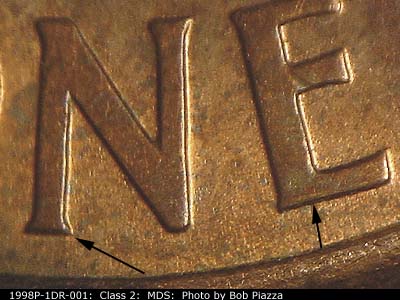 Die-stage B marker on 1998P•1DR•001 (1998 Doubled Die Reverse).