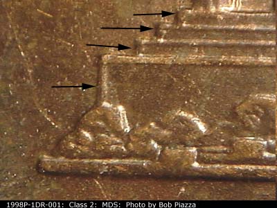 Die-stage B marker on 1998P•1DR•001 (1998 Doubled Die Reverse).