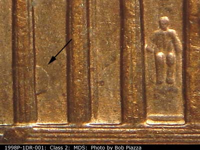 Die-stage B marker on 1998P•1DR•001 (1998 Doubled Die Reverse).