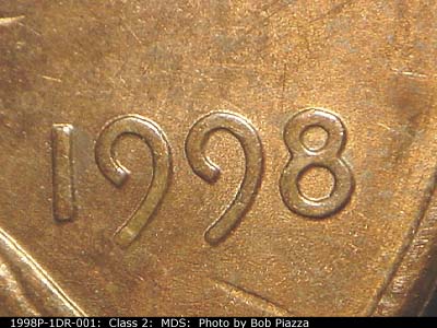 Die-stage B marker on 1998P•1DR•001 (1998 Doubled Die Reverse).