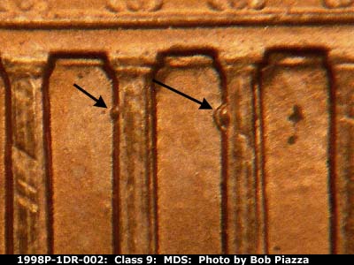 Die-stage B marker on 1998P•1DR•002 (1998 Doubled Die Reverse).
