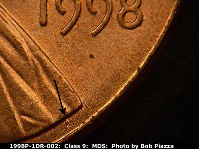 Die-stage B marker on 1998P•1DR•002 (1998 Doubled Die Reverse).