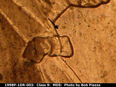 Die-stage B marker on 1998P•1DR•003 (1998 Doubled Die Reverse).