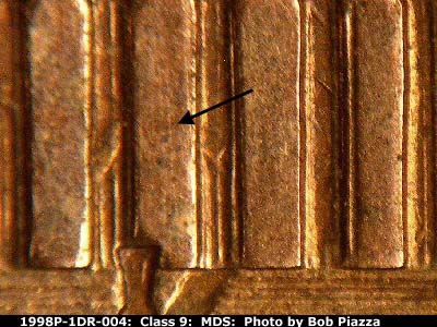 Die-stage B marker on 1998P•1DR•004 (1998 Doubled Die Reverse).