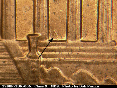 Die-stage B marker on 1998P•1DR•006 (1998 Doubled Die Reverse).