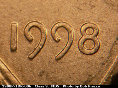 Die-stage B marker on 1998P•1DR•006 (1998 Doubled Die Reverse).