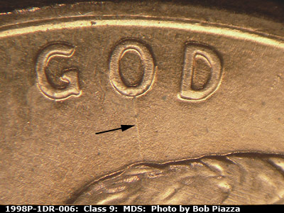 Die-stage B marker on 1998P•1DR•006 (1998 Doubled Die Reverse).