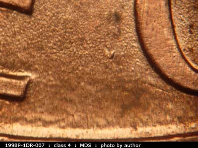 Die-stage B marker on 1998P•1DR•007 (1998 Doubled Die Reverse).