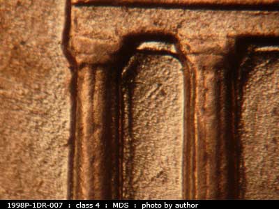 Die-stage B marker on 1998P•1DR•007 (1998 Doubled Die Reverse).
