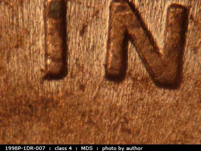 Die-stage B marker on 1998P•1DR•007 (1998 Doubled Die Reverse).
