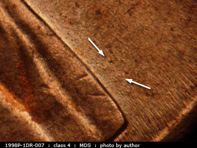 Die-stage B marker on 1998P•1DR•007 (1998 Doubled Die Reverse).