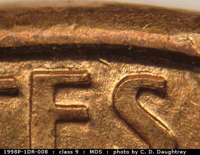 Die-stage B marker on 1998P•1DR•008 (1998 Doubled Die Reverse).