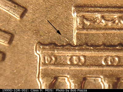 Die-stage B marker on 1999D•1DR•002 (1999 Doubled Die Reverse).