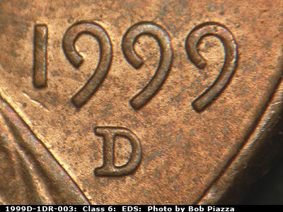 Die-stage A marker on 1999D•1DR•003 (1999 Doubled Die Reverse).