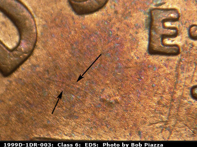 Die-stage A marker on 1999D•1DR•003 (1999 Doubled Die Reverse).