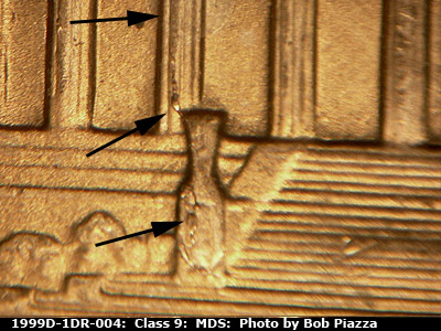 Die-stage B marker on 1999D•1DR•004 (1999 Doubled Die Reverse).
