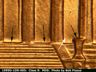 Die-stage B marker on 1999D•1DR•005 (1999 Doubled Die Reverse).