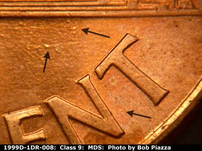 Die-stage B marker on 1999D•1DR•008 (1999 Doubled Die Reverse).