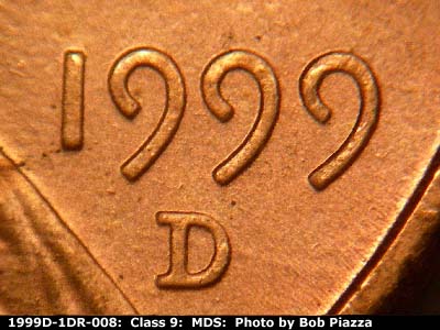 Die-stage B marker on 1999D•1DR•008 (1999 Doubled Die Reverse).