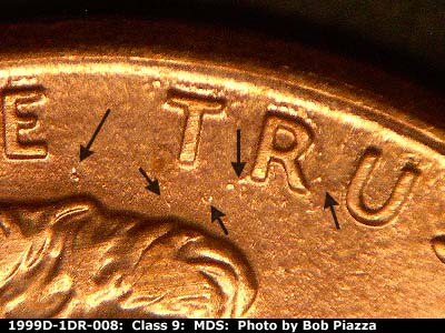 Die-stage B marker on 1999D•1DR•008 (1999 Doubled Die Reverse).