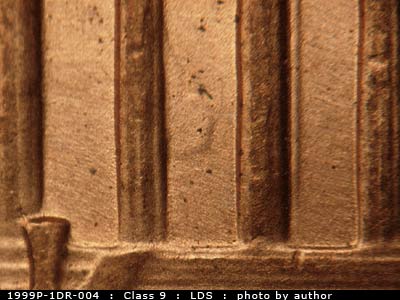 Die-stage C marker on 1999P•1DR•004 (1999 Doubled Die Reverse).