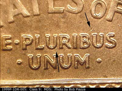 Die-stage B marker on 1999P•1DR•005 (1999 Doubled Die Reverse).